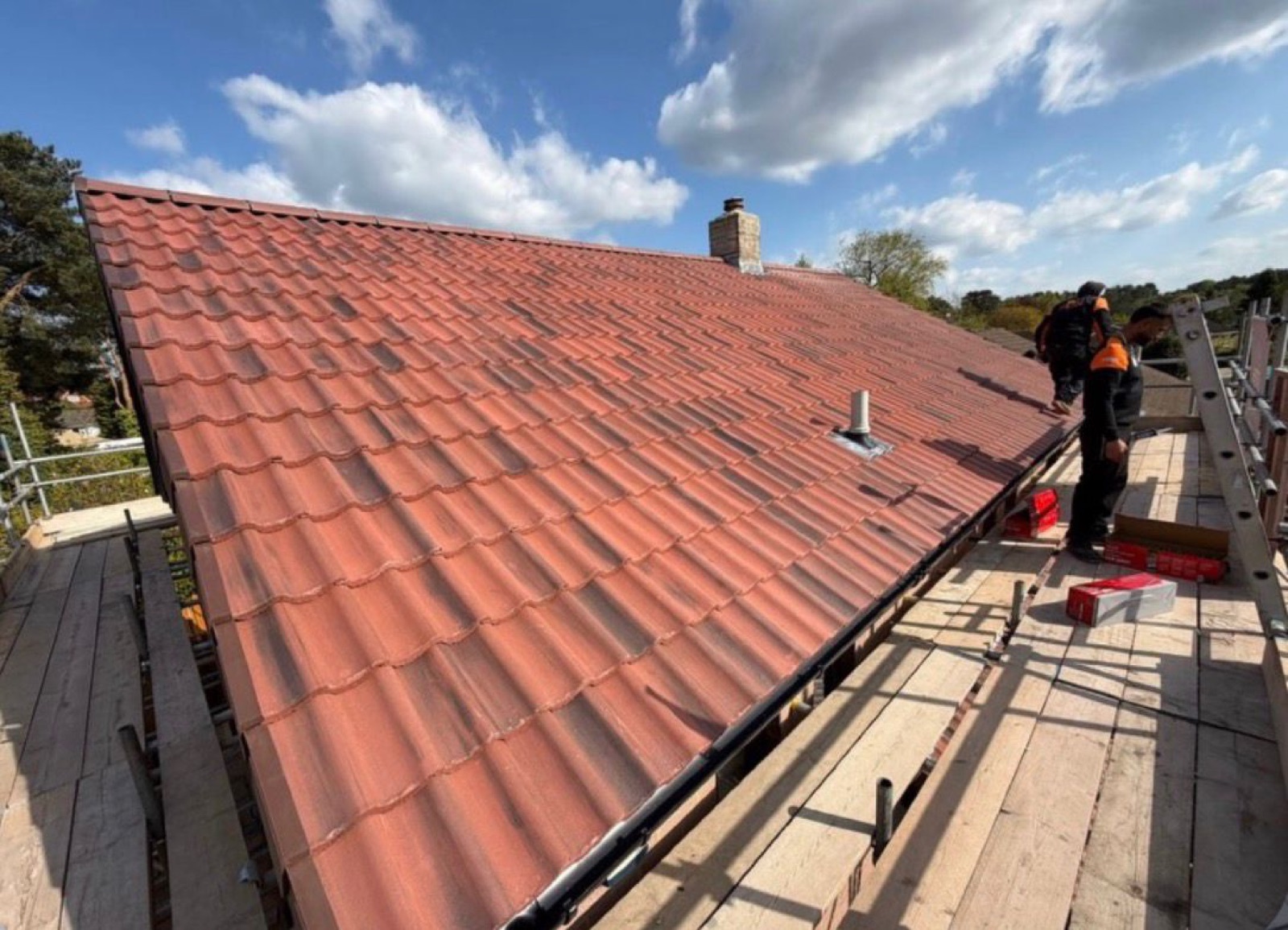 A1 Roofing team installing a new tiled roof