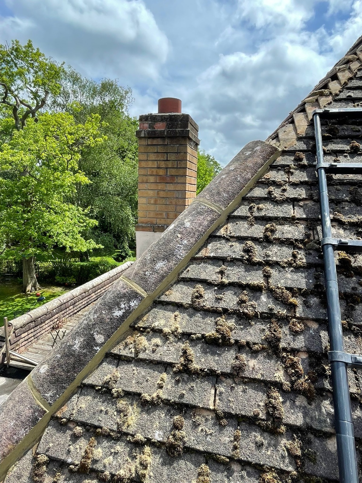 Ridge and chimney inspection before repair